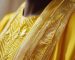 exquisite-embroidered-gold-fabric-rich-traditional-clothing-detail-free-photo
